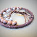 top view shows 3D effect  using wood beads and brown wire twisted to create tree of life